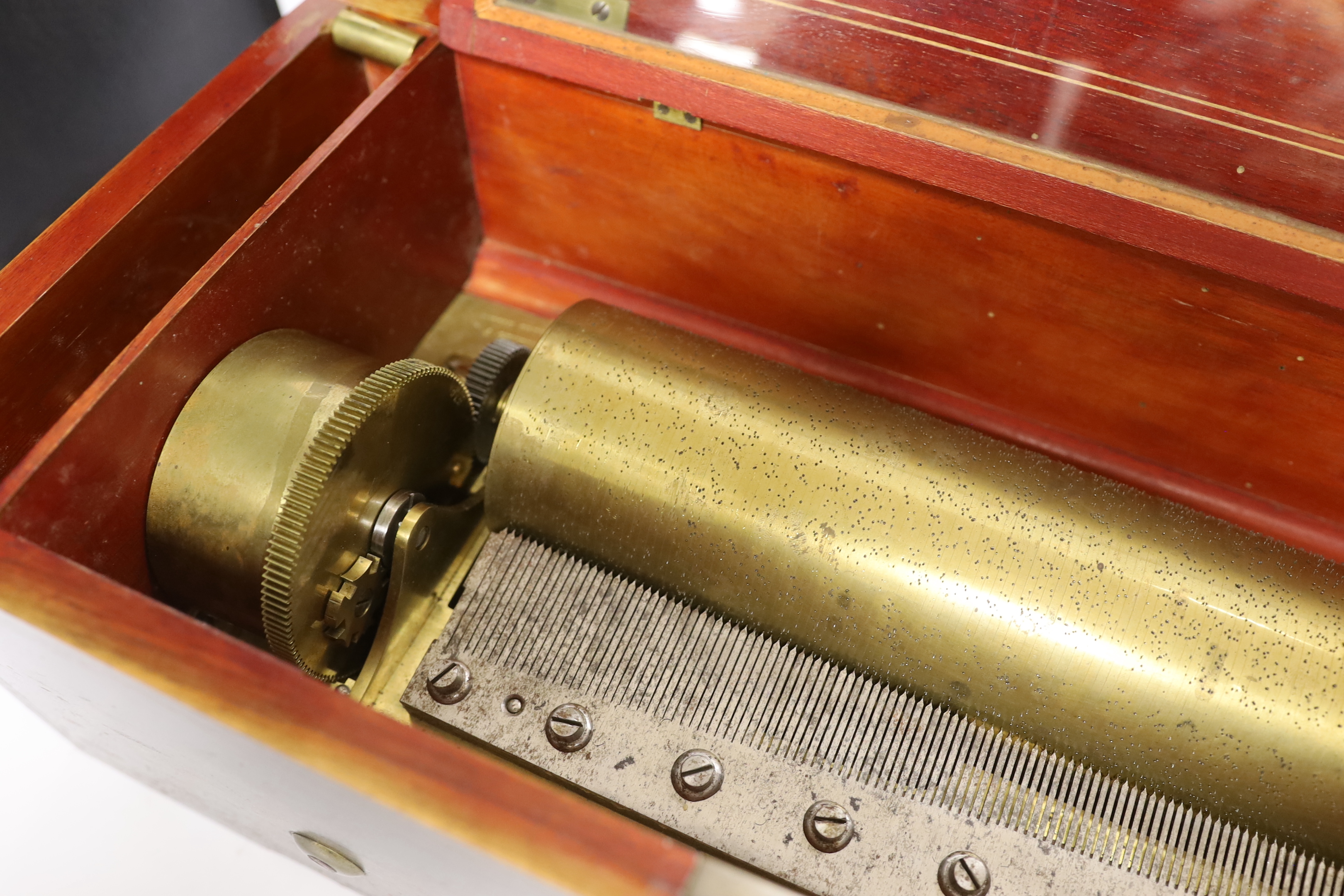 A late 19th century Swiss rosewood inlaid cylinder music box by Nicole Freres, playing twelve airs on one hundred and twenty-nine teeth, barrel 31cm wide, case 53cm wide, 22.5cm deep, 17cm high